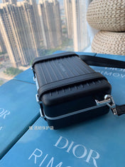 RIMOWA 20 CASE BAG IN BLACK ALUMINUM MAGNESIUM