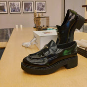 PRADA 26S PENNY LOAFERS 55MM IN DARK GREEN PATENT CALFSKIN
