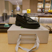 PRADA 26S PENNY LOAFERS 55MM IN DARK GREEN PATENT CALFSKIN
