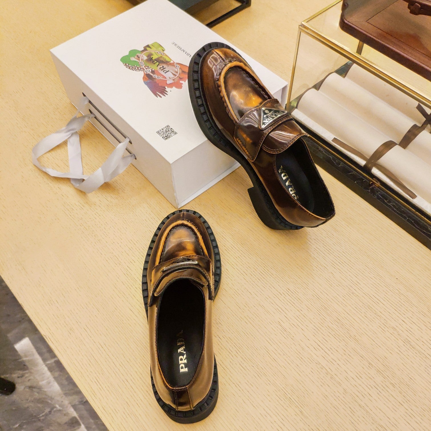PRADA 26S PENNY LOAFERS 55MM IN BROWN PATENT CALFSKIN