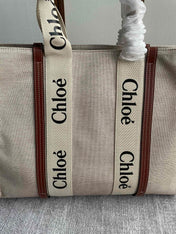 LAGRE STRAP WOODY TOTE BAG 45 IN BEIGE LINEN CANVAS BLACK WEBBING LOGO EMBROIDER BROWN CALFSKIN