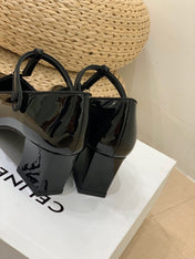 TRIOMPHE T-BAR HIGH PUMPS IN BLACK PATENT CALFSKIN