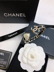 CHANEL 26S DOUBLE C LOGO BAROQUE PEARL LEATHER CHAIN BRACELET IN GOLD METAL 630841