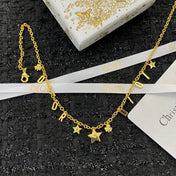 CD 26S DIOR LETTER CHARM STAR NECKLACE IN GOLD TONE METAL 631848