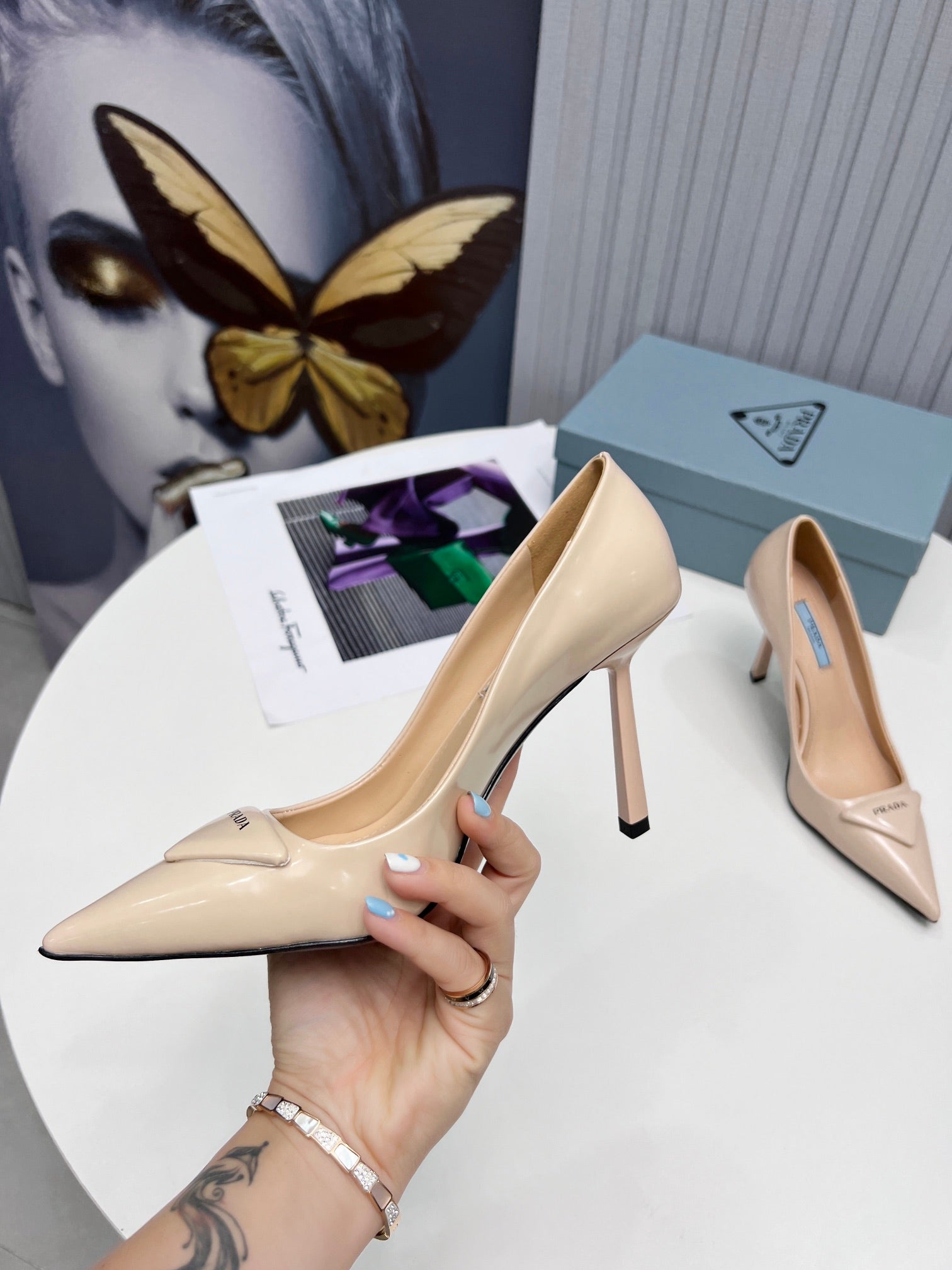 PRADA 26S POINTED TOE PUMPS STILETTO HEEL 95MM IN NUDE BEIGE PATENT CALFSKIN LOGO