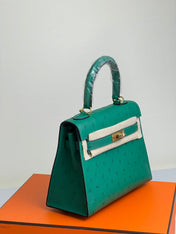 KELLY BAG 20 IN TEAL GREEN OSTRICH LEATHER WITH GOLD HARDWARE