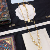 CD 26S CD LOGO CRYSTAL STATION NECKLACE IN GOLD TONE METAL WITH WHITE CRYSTAL 631006