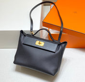 MINI 24/24 29CM IN BLACK EVERCOLOR CALFSKIN GOLD KELLY BUCKLE