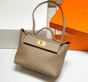 MINI 24/24 29CM IN TOGO ETOUPE EVERCOLOR CALFSKIN GOLD KELLY BUCKLE
