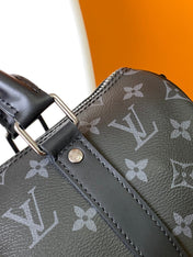 KEEPALL BANDOULIÈRE 25 IN BLACK MONOGRAM HERITAGE CANVAS