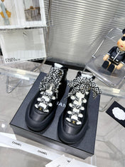 CC CANO ALTO SNEAKER IN BLACK CALFSKIN AND RUBBER