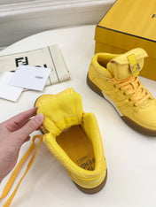 FENDI LOGO SOCK SNEAKER BOOTS IN CORN YELLOW LAMBSKIN