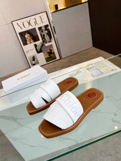 WOODY MULE IN WHITE LAMBSKIN WITH EMBROIDERED LOGO
