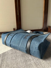 MEDIUM WOODY TOTE BAG 37 IN BLUE DENIM BLACK CALFSKIN
