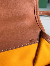 SAINT LÉGER BACKPACK 35 IN BROWN GOYARDINE CANVAS AND CALFSKIN WITH CARTOON PATCH