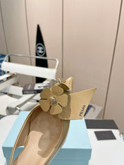 SLINGBACK KITTEN HEEL IN TORTILLA BROWN SHINY CALFSKIN ATTACHED FLOWERS