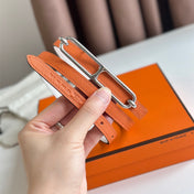 HM ROULIS BUCKLE & REVERSIBLE ORANGE AND WHITE LEATHER STRAP 13MM SILVER HARDWARE