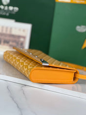 MONTE-CARLO PM CLUTCH 25 IN YELLOW GOYARDINE CANVAS