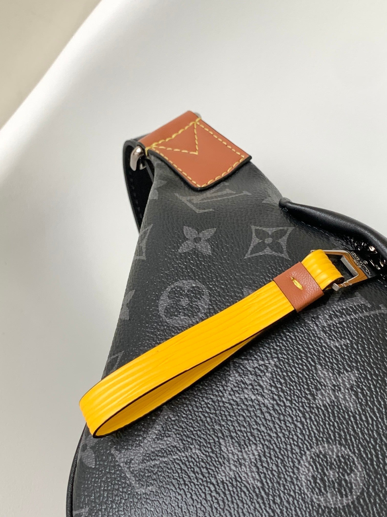 LV 25S BUMBAG 37 IN BLACK AND YELLOW COATED MONOGRAM CALFSKIN