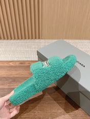 FURRY SLIDES IN TURQUOISE CURLY SHEARLING