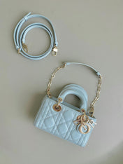 MINI D-JOY BAG 17 IN LIGHT BLUE LAMBSKIN