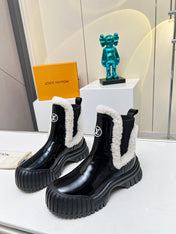 LV RUBY FLAT ANKLE BOOT IN BLACK CALFSKIN AND WHITE SHEARLING