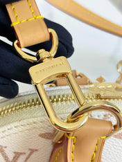 ALMA  BB 25 IN WHITE MONOGRAM DUNE CANVAS GOLD HARDWARE