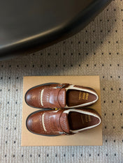 MIUMIU 26S FRINGE BUCKLE LOAFERS IN BROWN CALFSKIN