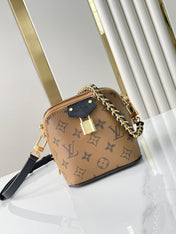 JUST IN CASE 14 IN BROWN MONOGRAM REVERSE CANVAS GOLD HARDWARE