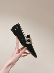 MINI BROCHE VIVIER BUCKLE LOAFERS IN BLACK PATENT CALFSKIN