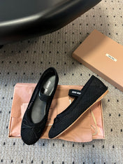 MIUMIU 26S BALLERINAS IN BLACK MESH FABRIC WITH BOW
