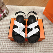 HM 26S CROSS-STRAP SANDALS IN BLACK AND WHITE CALFSKIN