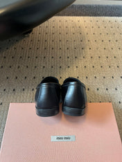 MIUMIU 26S LOAFERS IN BLACK CALFSKIN