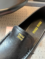 MIUMIU 26S LOAFERS IN BLACK CALFSKIN