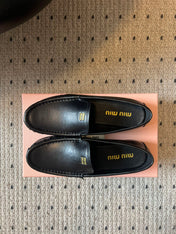 MIUMIU 26S LOAFERS IN BLACK CALFSKIN