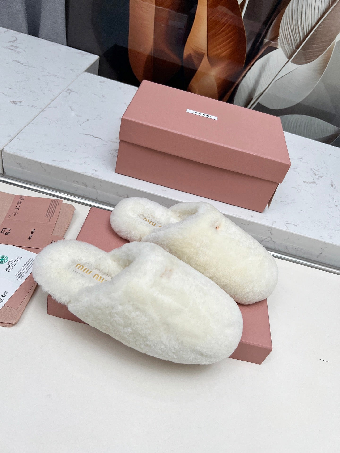 MIUMIU 26S MULES IN CREAM WHITE SHEARLING