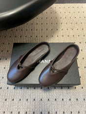 BOTTEGA VENETA 26S FLAT MULES IN DARK BROWN LAMBSKIN