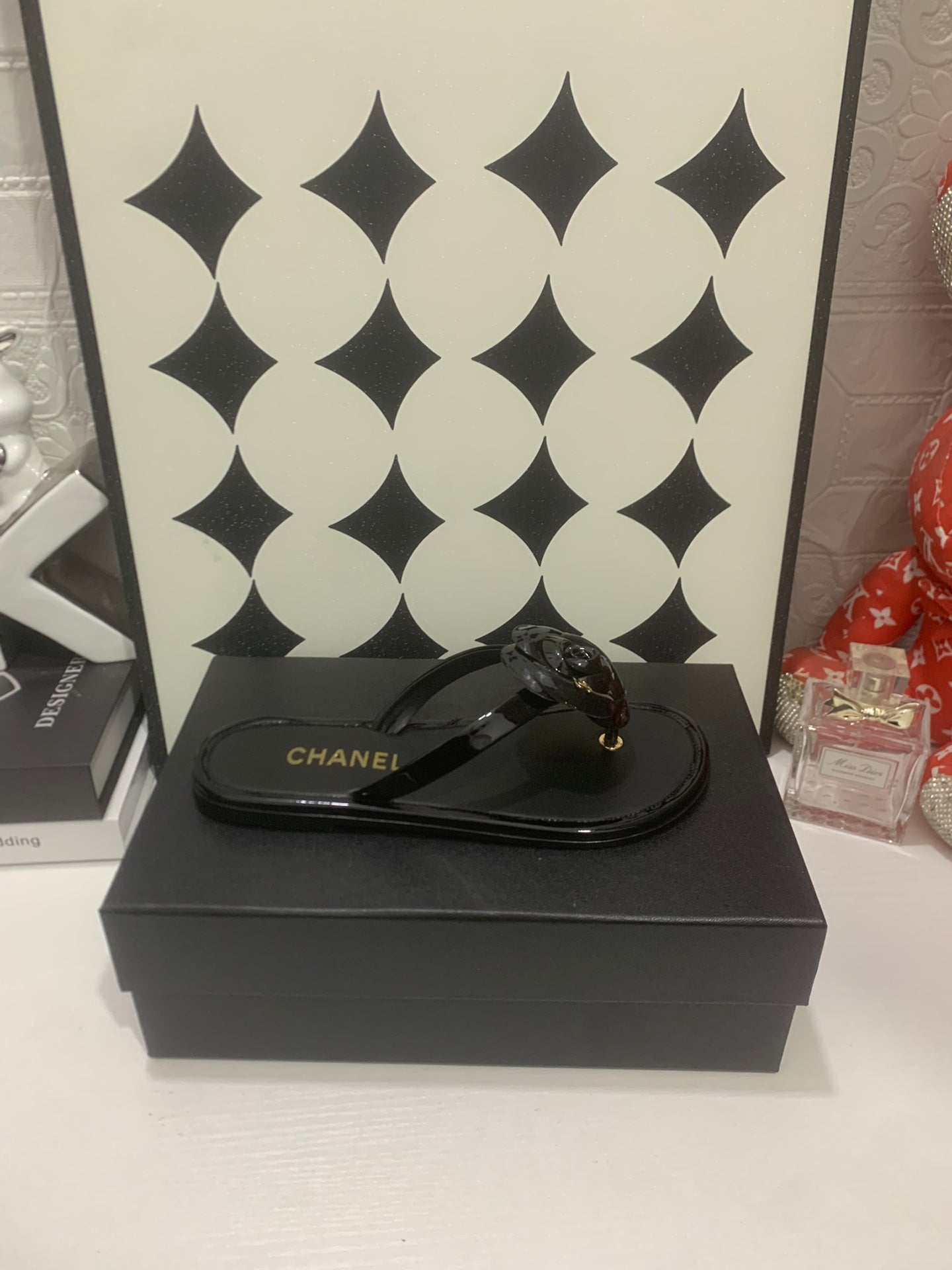CHANEL 26S THONG SANDALS IN BLACK LAMBSKIN WITH FLORAL