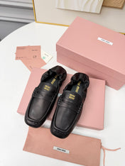 MIUMIU 26S RUCHES LOAFERS IN BLACK LAMBSKIN