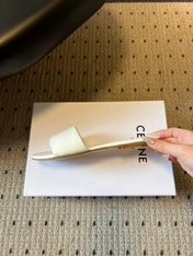CELINE 26S FLAT SLIDES IN WHITE LAMBSKIN