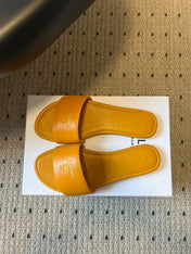 CELINE 26S FLAT SLIDES IN HONEY YELLOW LAMBSKIN