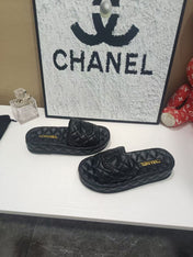 CHANEL 26S QUILTED SLIDE SANDALS IN BLACK CALFSKIN