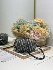 DIOR 26S BOW POUCH BAG 20 IN BLACK AND BEIGE OBLIQUE JACQUARD