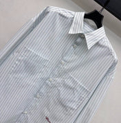 CHANEL STRIPED EMBROIDERED LOGO SHIRT WITH VERTICAL STRIPES