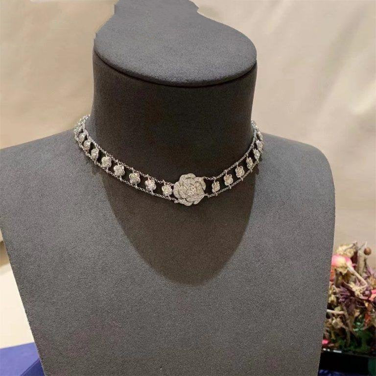 chanel-bouton-de-camelia-necklace-18k-white-gold-diamonds-j12063-coral-1-768x768_f3882e24-d33b-4015-8d36-85d3a0bbc2b8.jpg
