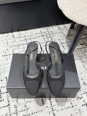 HIGH SLINGBACK 25S IN BLACK FABRIC AND CALFSKIN