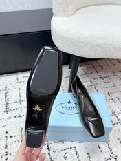 PRADA 26S SQUARE-TOE HIGH HEELS 35MM IN BLACK SHINY CALFSKIN WITH LOGO