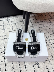 DIOR 26S HIGH HEEL SLIDES IN BLACK AND WHITE EMBOSSED OBLIQUE LACE EMBROIDERY