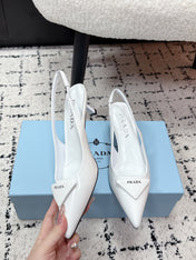 PRADA 26S SLINGBACK PUMPS 60MM IN WHITE PATENT CALFSKIN