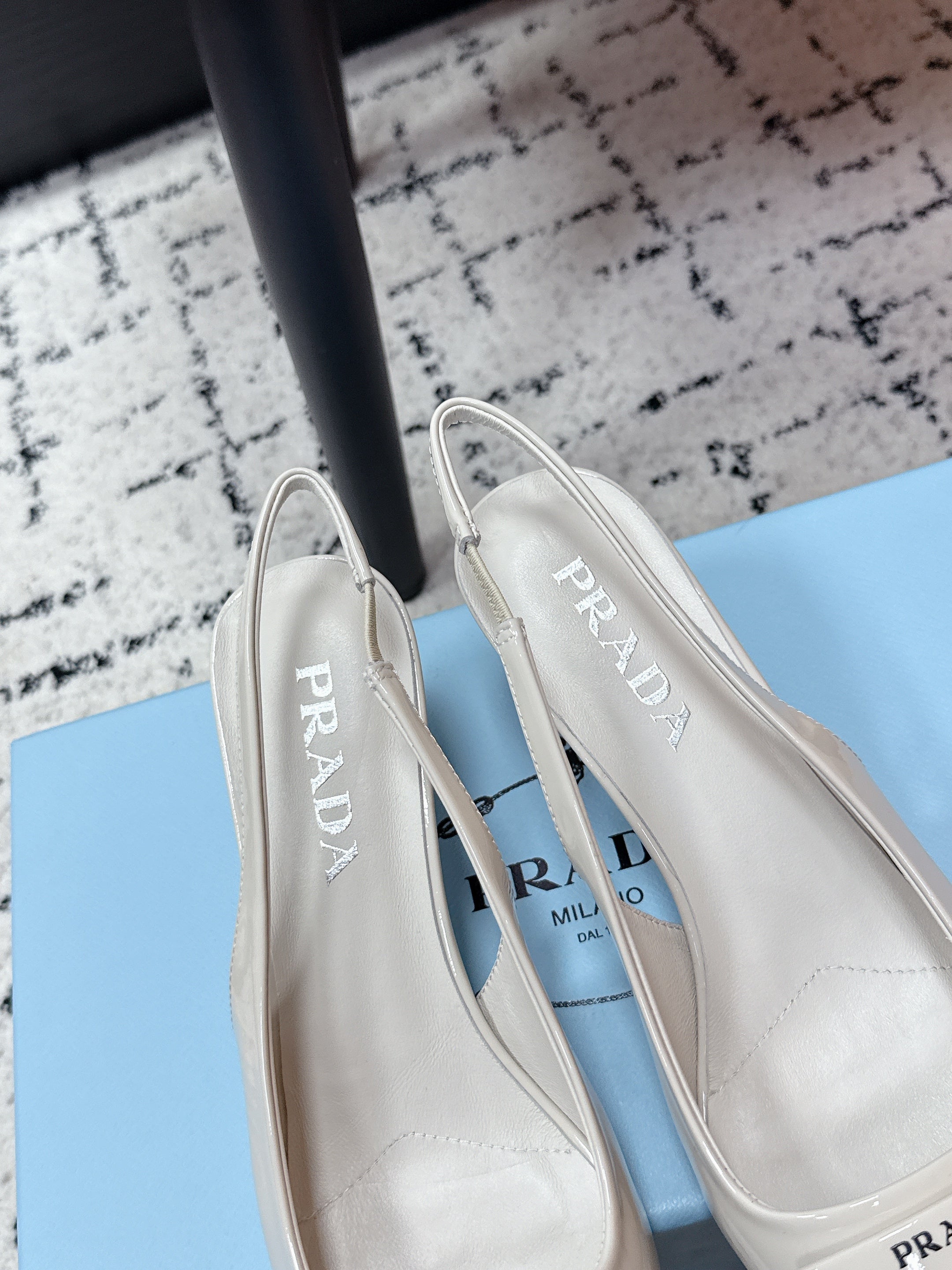 PRADA 26S SLINGBACK PUMPS 60MM IN CREAM WHITE PATENT CALFSKIN